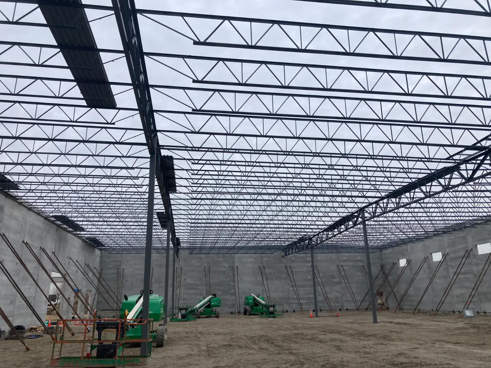 Steel joists and precast walls going up on a QDBI industrial build